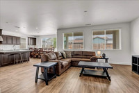 Living area. Living room, kitchen, and eat in dining area.