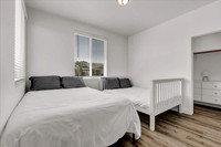 bedroom 2 with a queen and full bed.