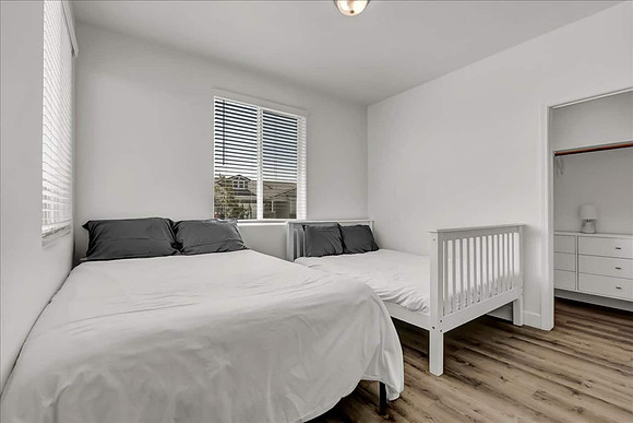 bedroom 2 with a queen and full bed.
