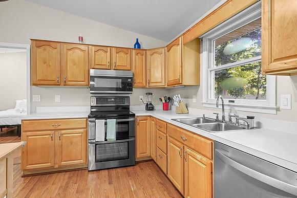 Full size refrigerator, microwave, stove and dishwasher