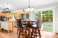 dining area with a table for 5