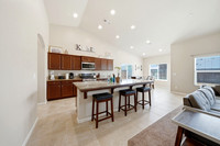 full kitchen with seating at the island for 3