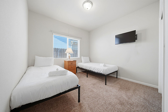 bedroom 1, two single beds