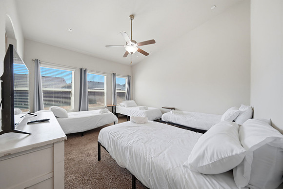 bedroom 3, 4 single beds