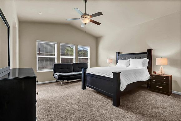 Master bedroom, king bed and a futon