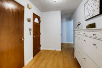 Front entrance with a shoe cabinet.