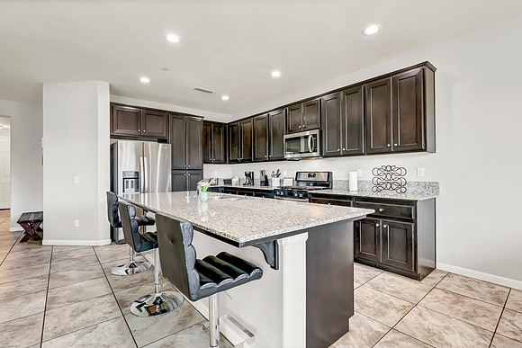 Kitchen, microwave, and gas stove