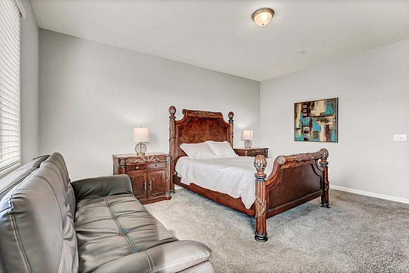 Master bedroom, king bed and futon