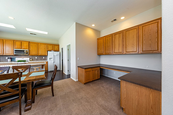 Office space, dining area and kitchen
