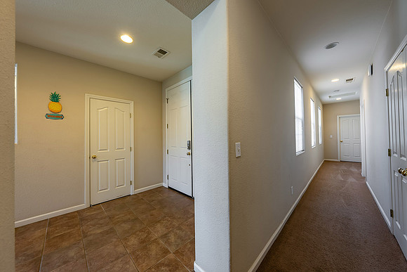 front entrance, hallway to bedrooms